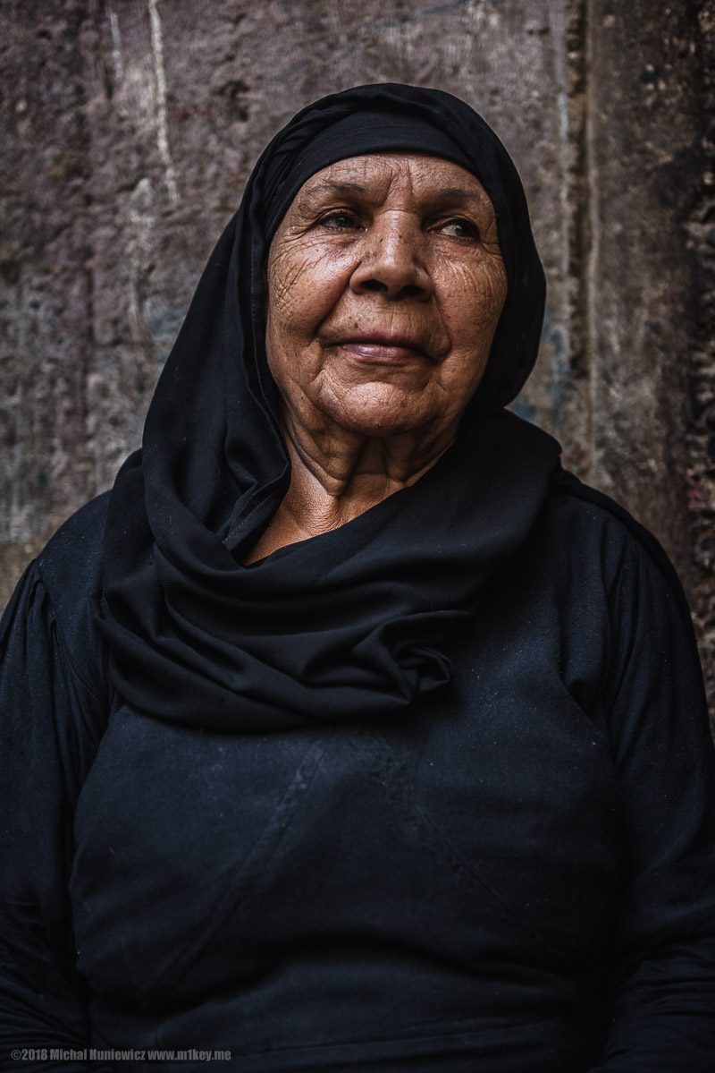 Old Woman Clad In Black